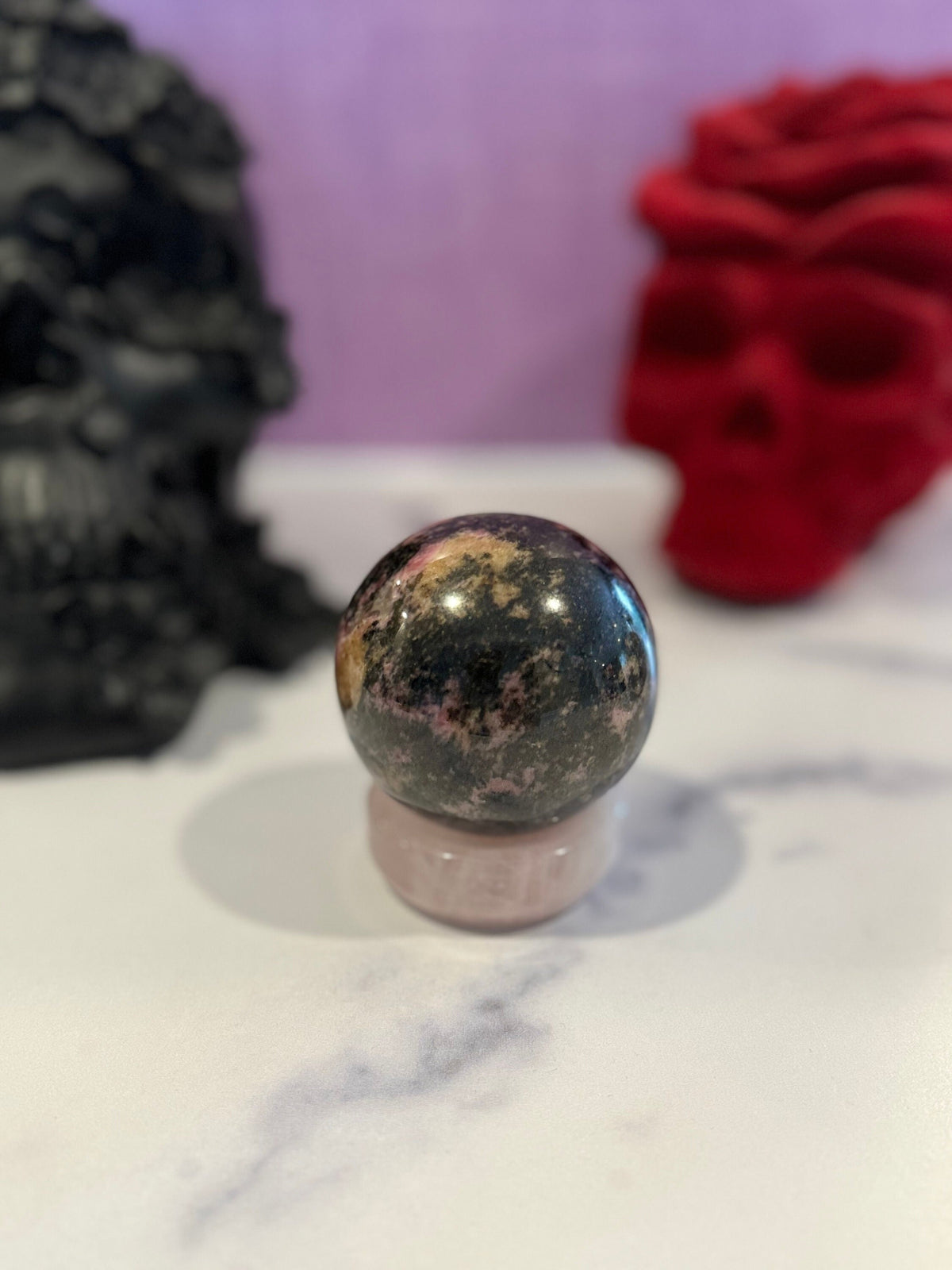 rhodonite crystal sphere, sunset rhodesphere, pink black crystals