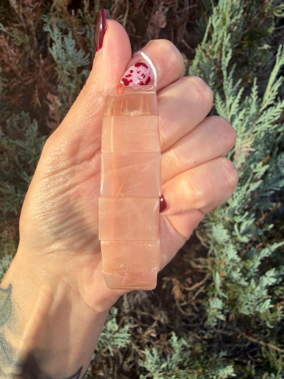 Peach Moonstone soft bangle bracelet with smooth polished peach gemstone beads and flexible band design.