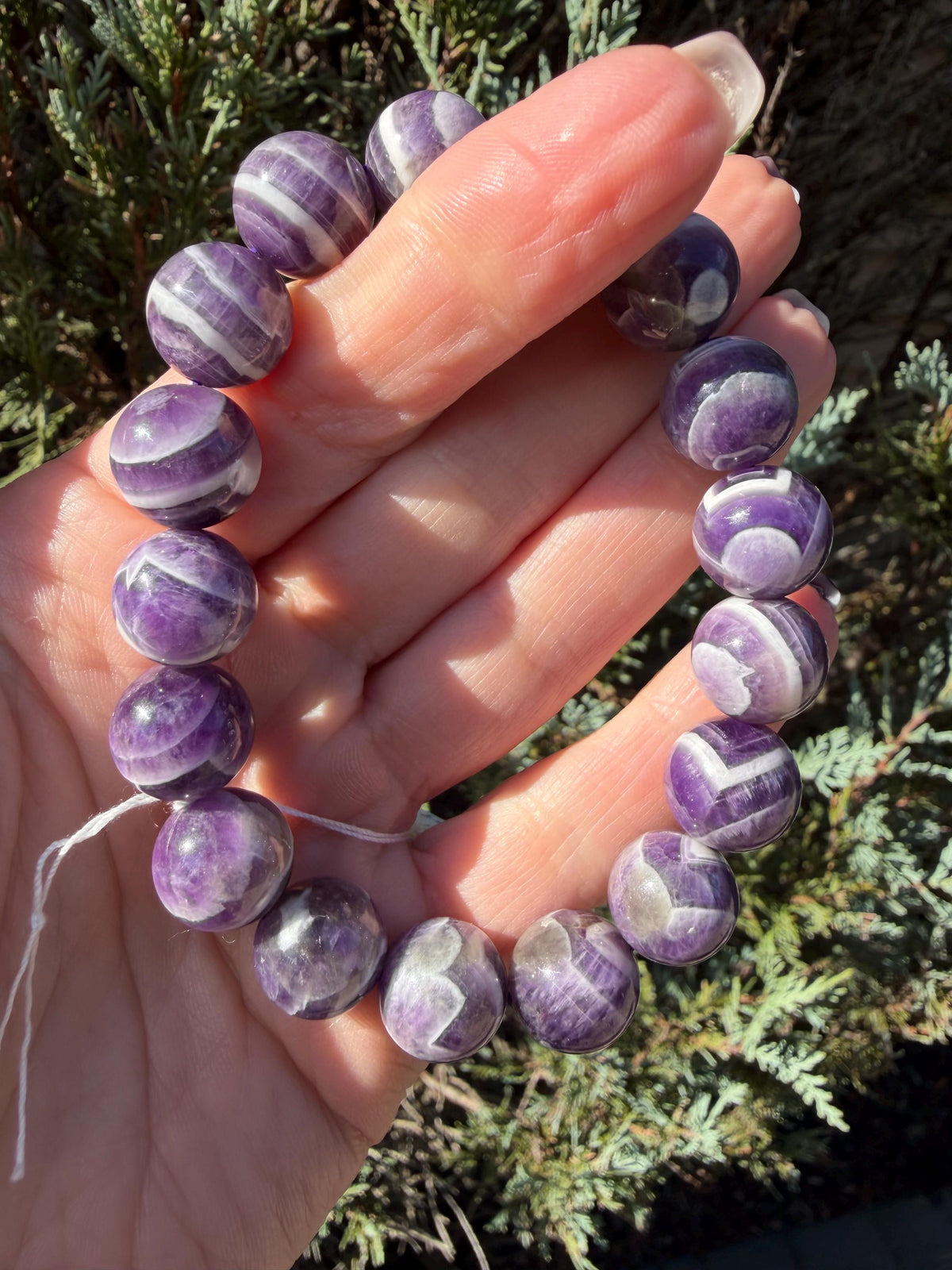 13mm Chevron Dream Amethyst beaded bracelet with purple and white banded gemstone beads.