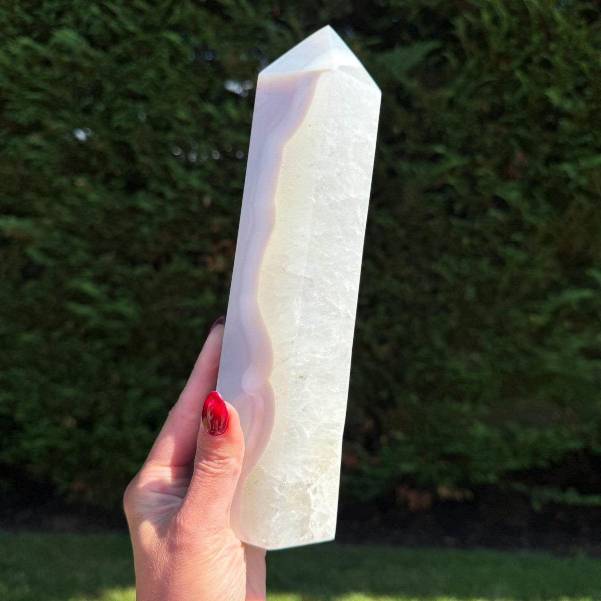 XL Blue Banded Agate Quartz Crystal Tower with polished surface showing layered blue and white banding.
