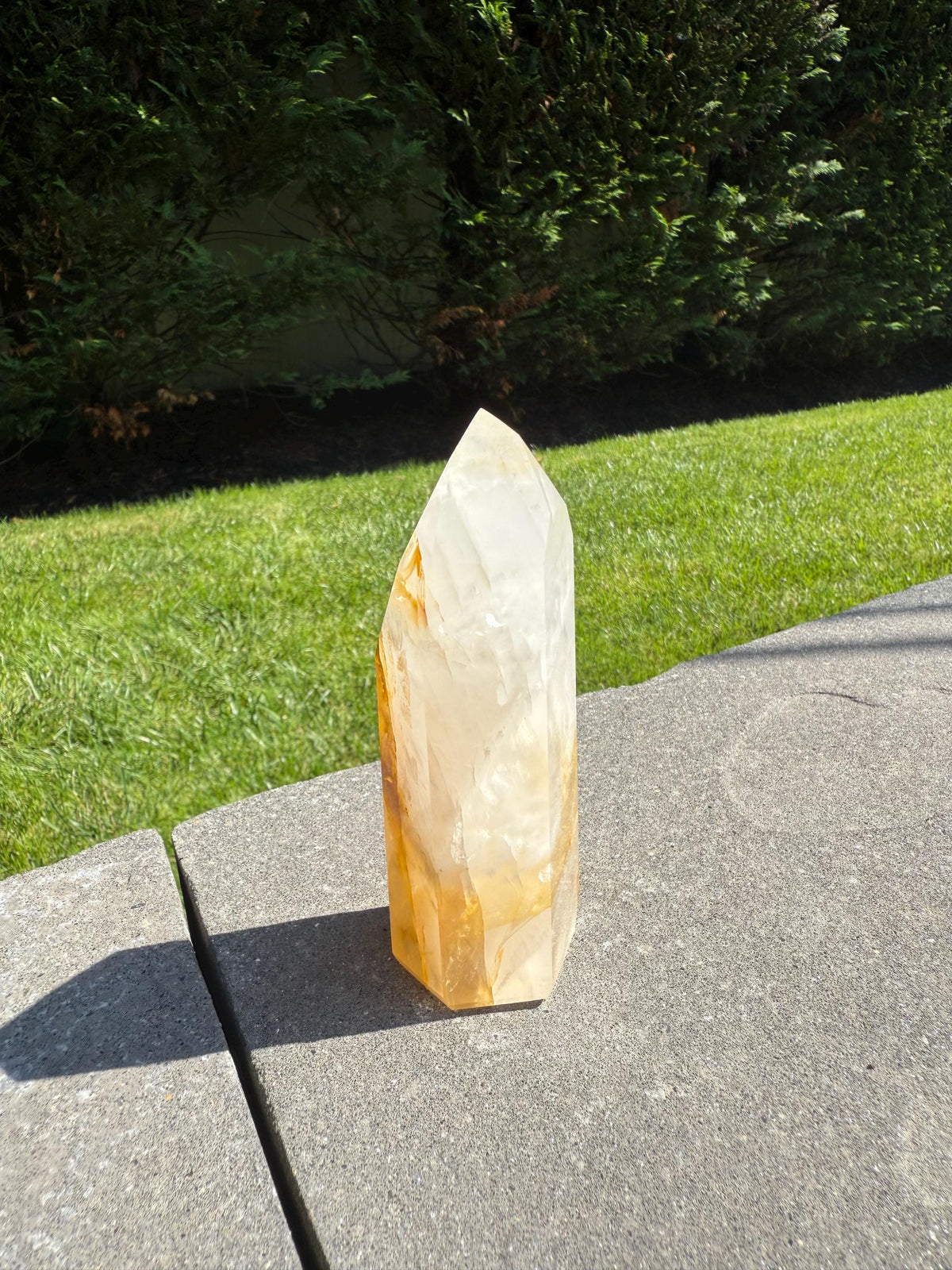 Side view of Girasol and Golden Healer Tower showing luminous white and golden inclusions.