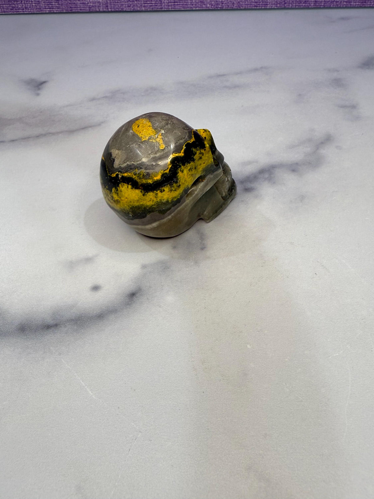 Yellow & Black Jasper Crystal Skull: Earthy Protection Stone