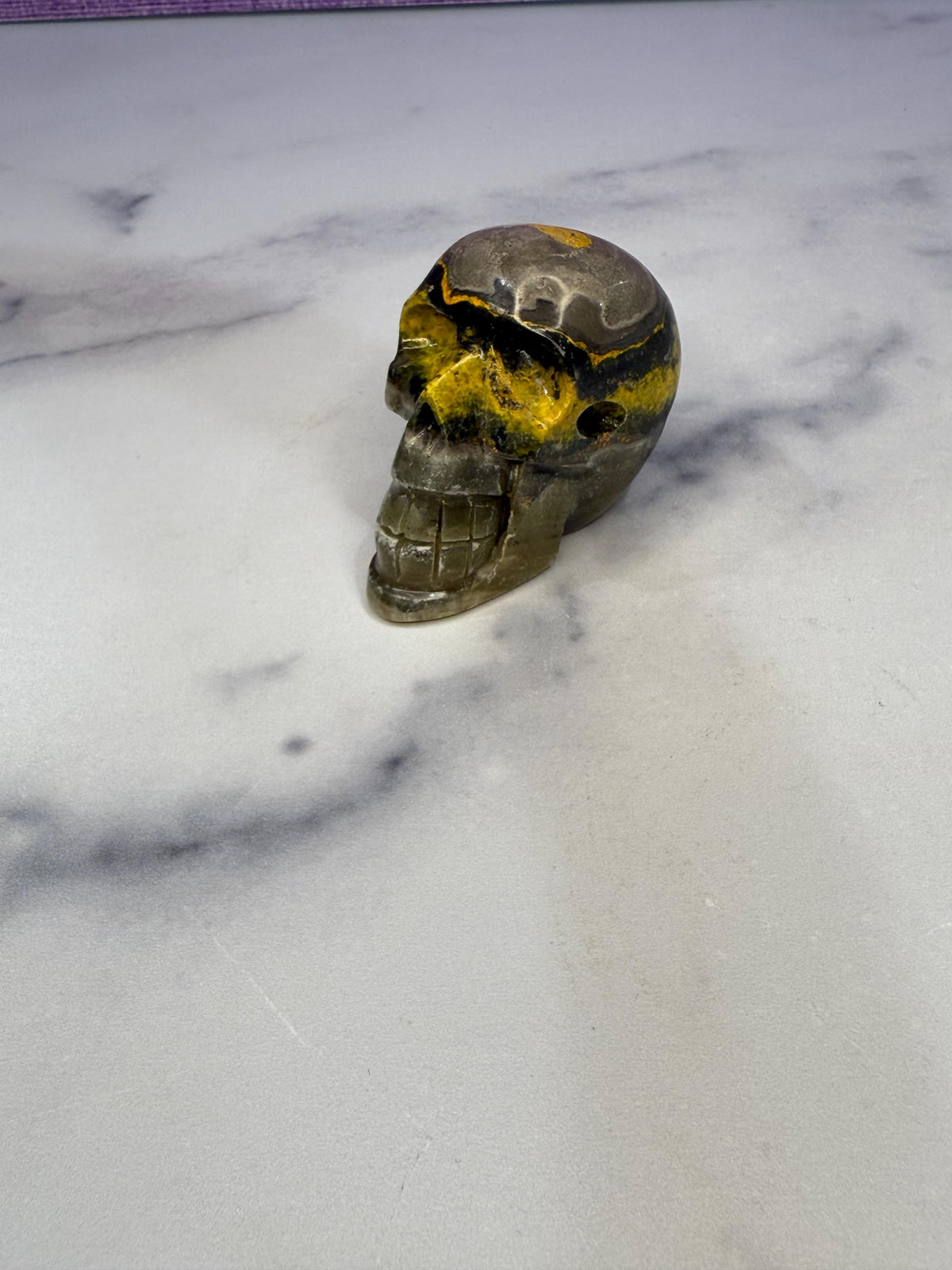 Yellow & Black Jasper Crystal Skull: Earthy Protection Stone