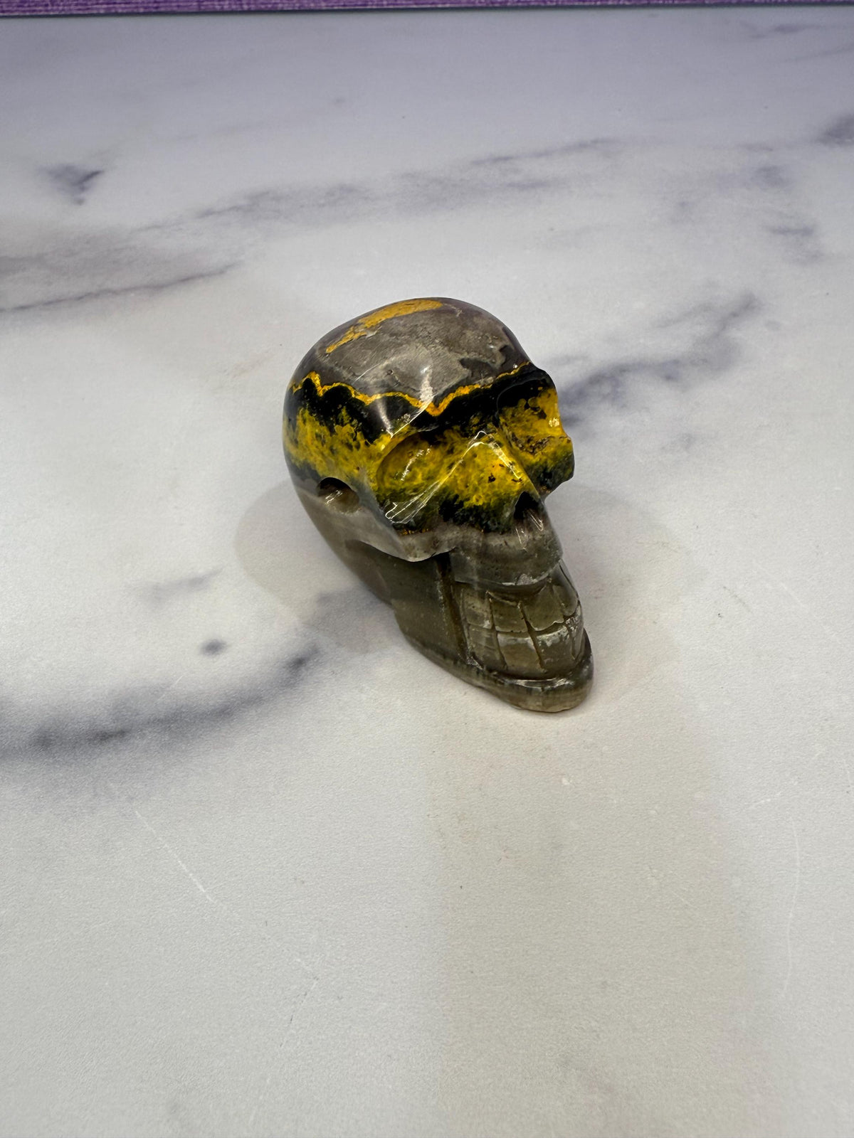 Yellow & Black Jasper Crystal Skull: Earthy Protection Stone